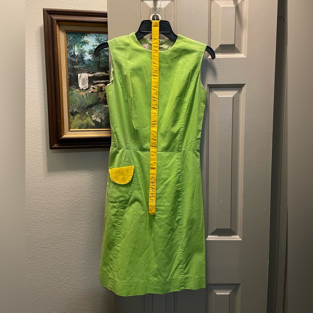 Vintage green golf dress with matching yellow belt.